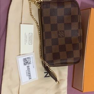 Mini pochette Damier Ebene